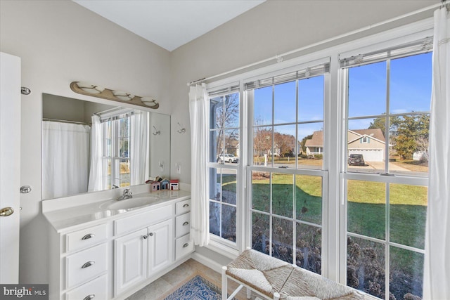 bathroom with vanity and tile patterned floors