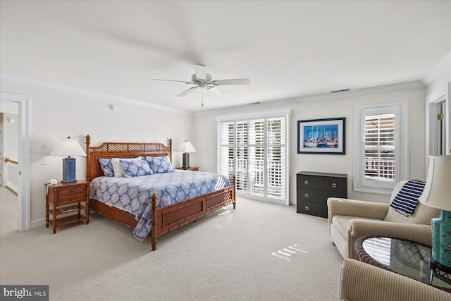 carpeted bedroom with ornamental molding, access to exterior, and ceiling fan