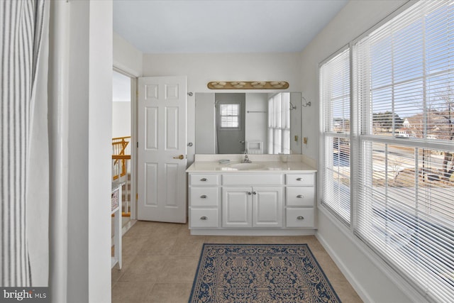 bathroom with vanity and tile patterned floors