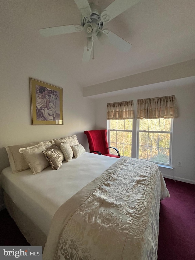 bedroom featuring ceiling fan and carpet flooring