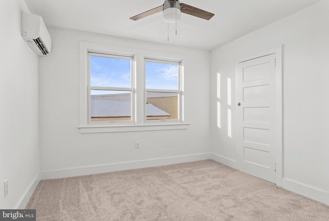 carpeted empty room featuring an AC wall unit and ceiling fan