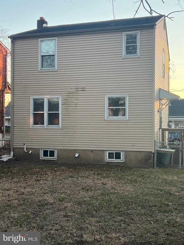 view of property exterior at dusk