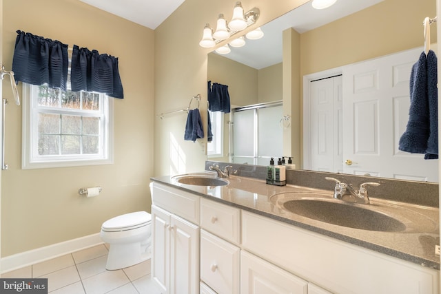 bathroom featuring walk in shower, tile patterned floors, toilet, and vanity