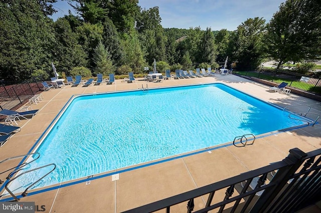 view of pool featuring a patio area