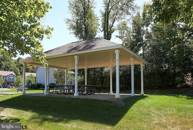 surrounding community featuring a gazebo and a lawn