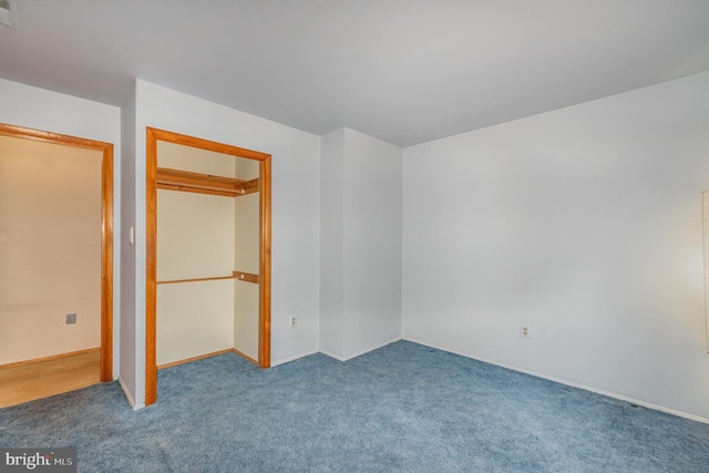 unfurnished bedroom with carpet