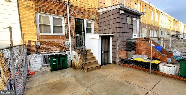 doorway to property featuring a patio