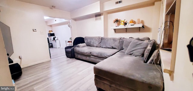 living room featuring light hardwood / wood-style flooring