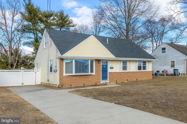 view of front of home with a front yard