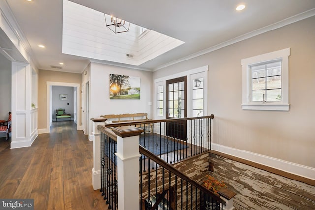 hallway with recessed lighting, dark wood-style flooring, an upstairs landing, baseboards, and crown molding