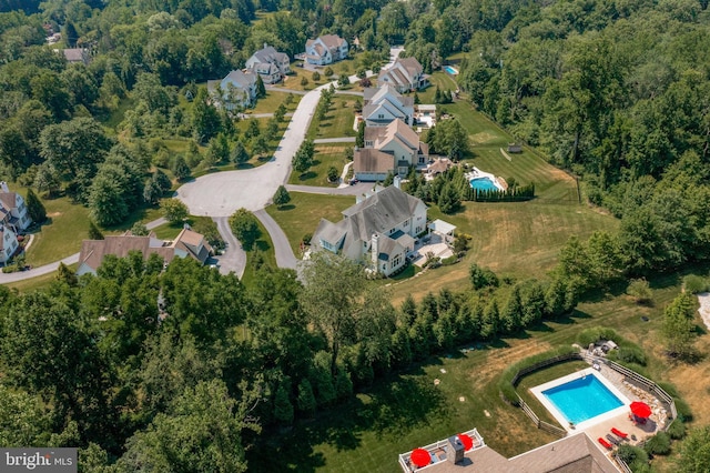 aerial view with a wooded view