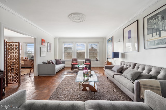 living room featuring parquet flooring and ornamental molding