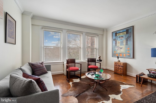 living room featuring ornamental molding and parquet floors