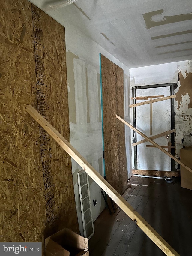 miscellaneous room featuring wood-type flooring