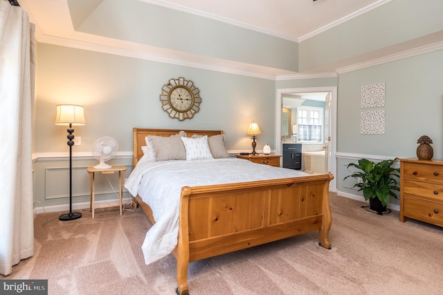 bedroom with carpet floors, ornamental molding, and wainscoting