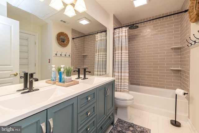 bathroom with toilet, shower / bath combo, visible vents, and a sink