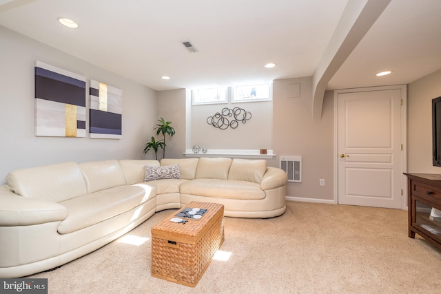 living area with carpet flooring, recessed lighting, and visible vents