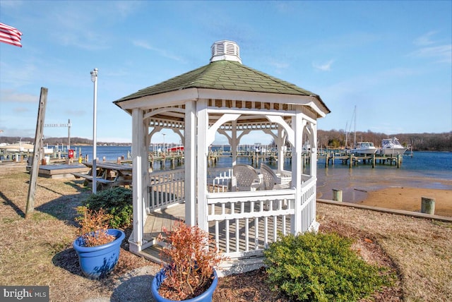 dock area featuring a gazebo and a water view