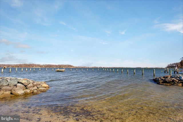 view of dock with a water view