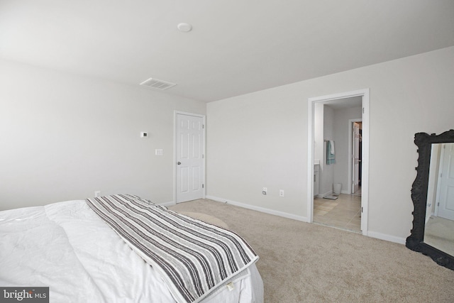 bedroom featuring carpet, visible vents, and baseboards