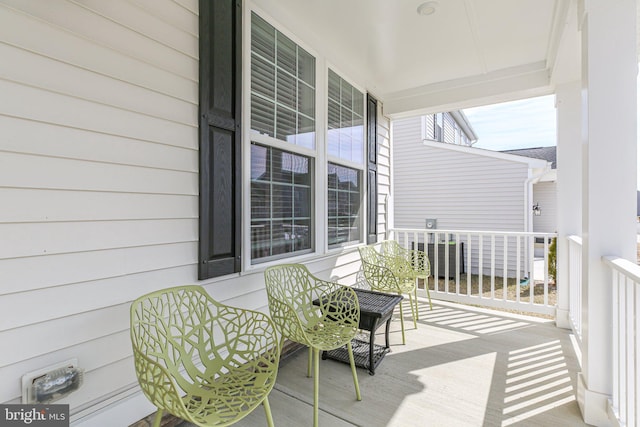 wooden terrace with covered porch