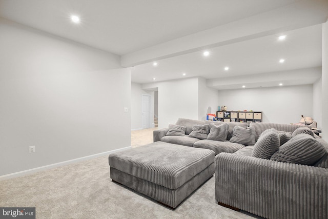 carpeted living area featuring recessed lighting, baseboards, and stairs