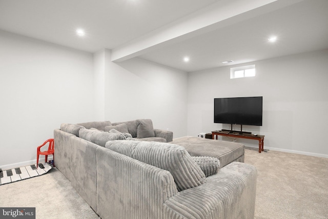 living area with light carpet, baseboards, and recessed lighting