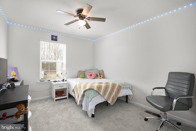 carpeted bedroom with baseboards