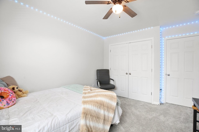 bedroom with carpet and a closet