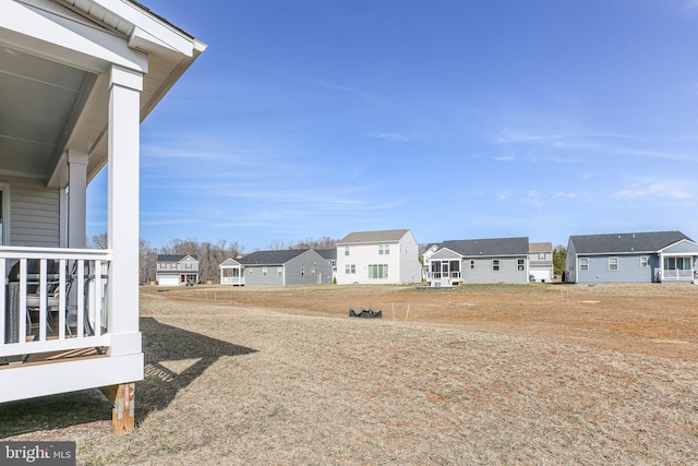 view of yard with a residential view