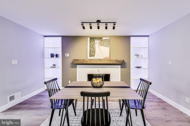 dining room featuring wood-type flooring