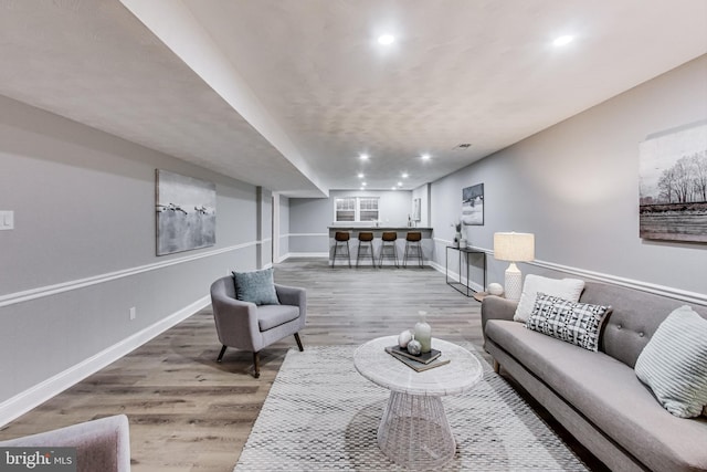 living room with hardwood / wood-style floors