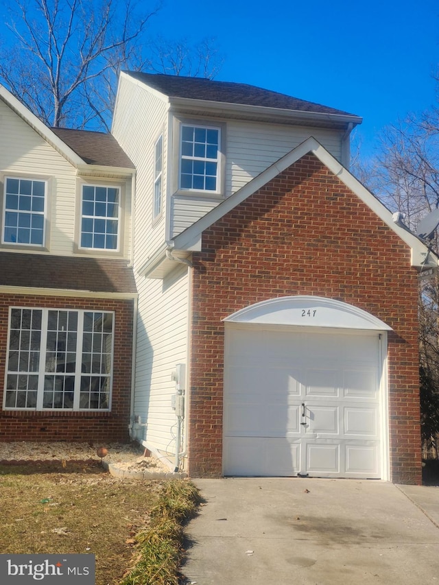 view of front of property featuring a garage