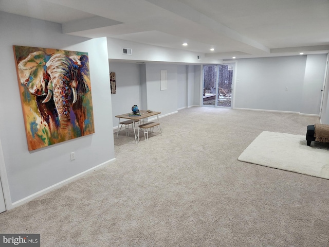 basement featuring carpet flooring