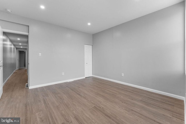 empty room with light wood-type flooring