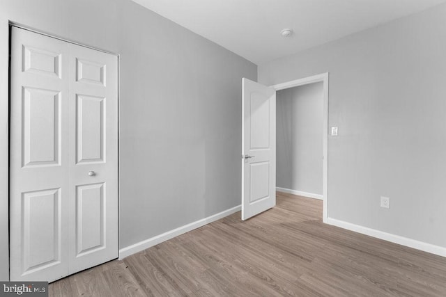 unfurnished bedroom featuring light hardwood / wood-style flooring