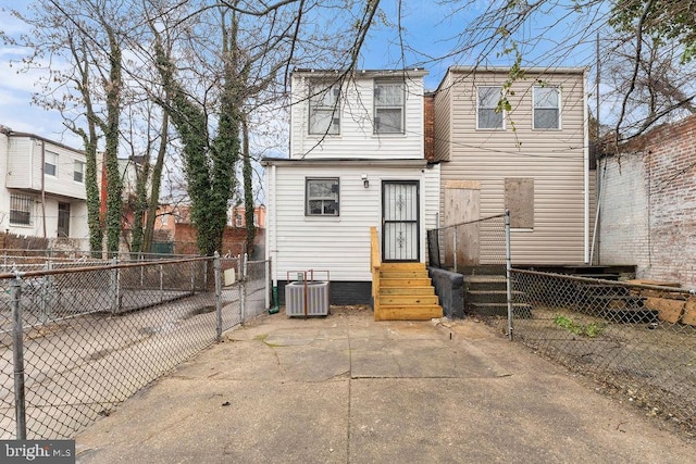 view of front of house with central AC