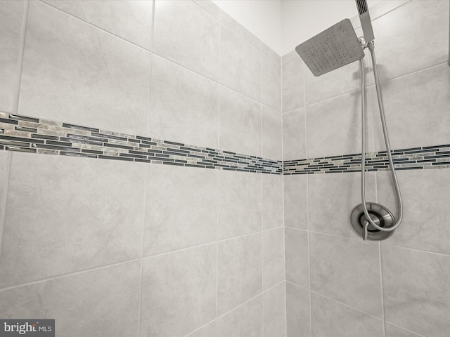 room details with a tile shower