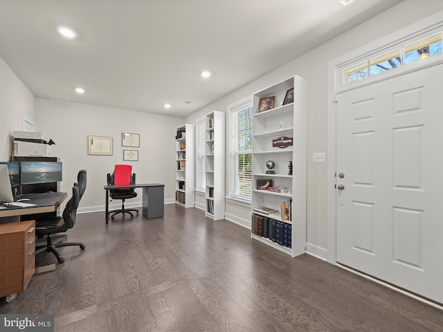 interior space featuring recessed lighting, visible vents, baseboards, and wood finished floors