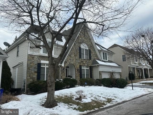 view of front of home featuring stone siding