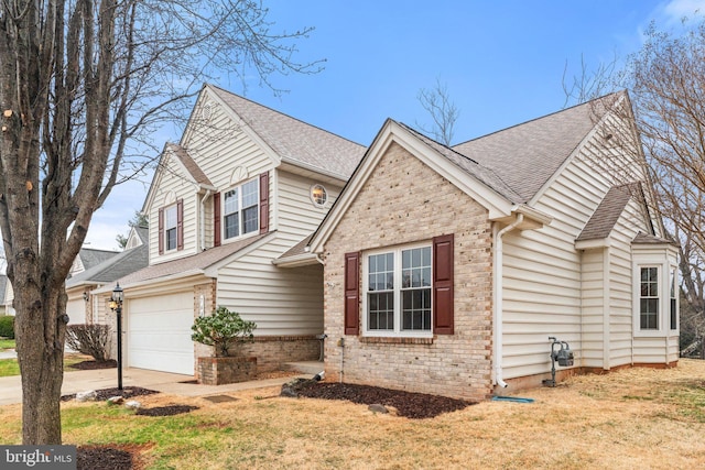 view of front of house featuring concrete driveway, brick siding, an attached garage, and roof with shingles