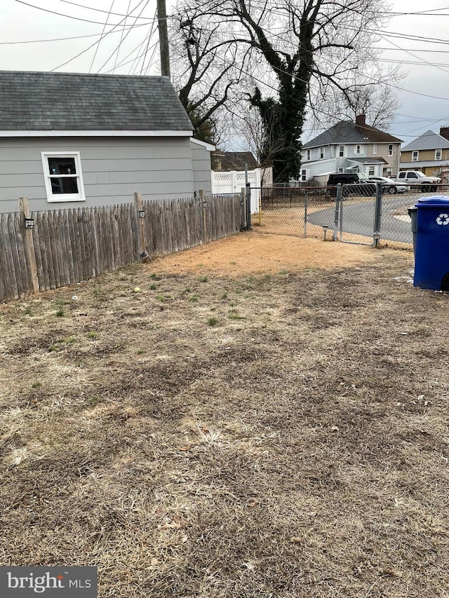 view of yard with fence