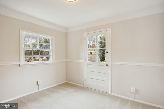 empty room with light colored carpet