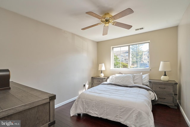 bedroom with a ceiling fan, baseboards, visible vents, and dark wood-style flooring