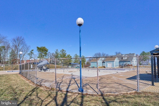 surrounding community featuring fence