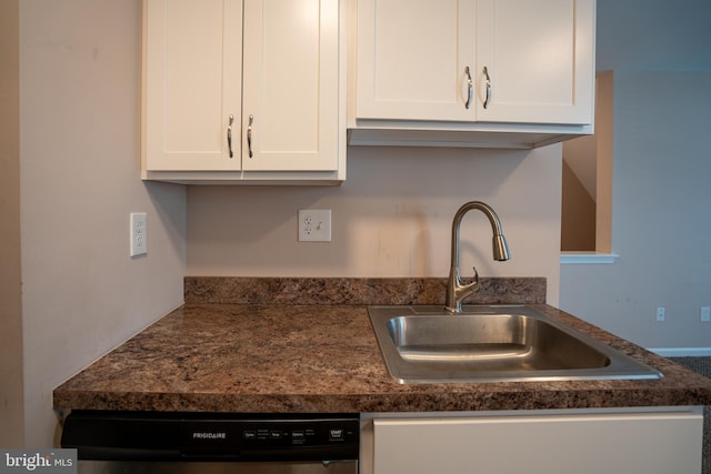 kitchen with white cabinetry, sink, and stainless steel dishwasher