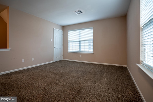 view of carpeted spare room