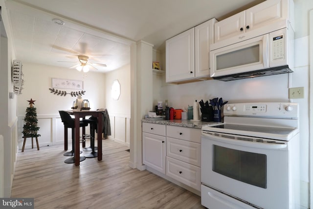 kitchen featuring white cabinetry, white appliances, light hardwood / wood-style floors, and ceiling fan