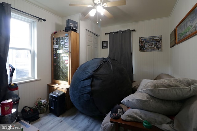 bedroom featuring ceiling fan and light wood-type flooring