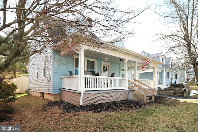 bungalow-style home with a porch